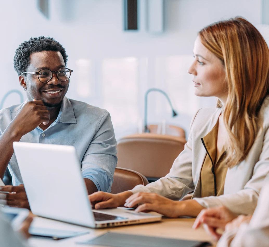 Woman giving man carreer guidance